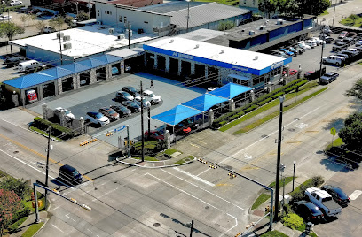 J&T Automotive. Foreign & Domestic Repair Center.